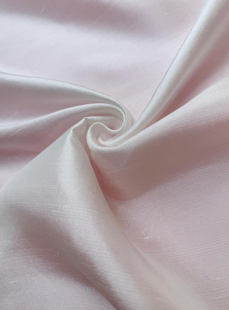 Light pink fabric with folds